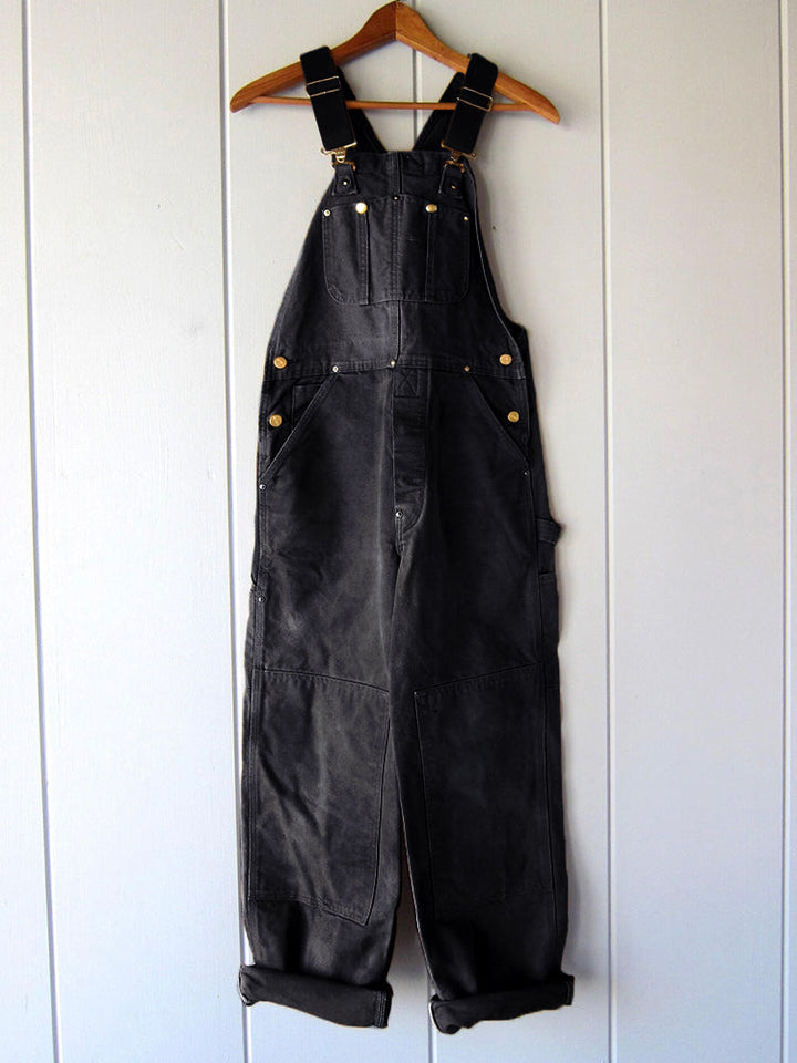 Stilvolle Herren Canvas Latzhose, Vintage-Look für modische urbane Freizeitmode und Outdoor-Aktivitäten.