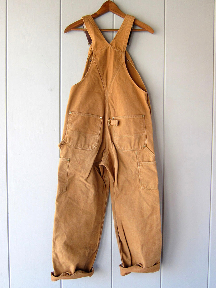 Praktische Taschen der Herren Canvas Latzhose, inklusive Werkzeugschlaufe; ideal als Arbeitskleidung.
