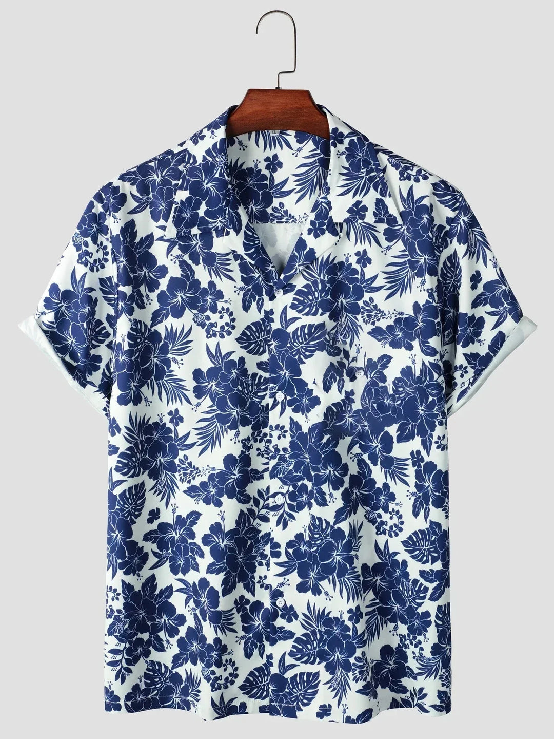 Herren Hawaihemd mit lebhaftem tropischem Blumendruck, ideal für Sommerurlaub und Strand. Kurzarm, entspannter Schnitt.