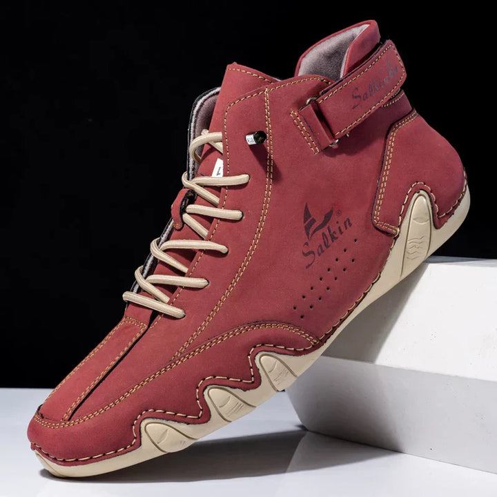 High-Top-Schuhe für Herren. Kombinieren Robustheit mit Stil dank Wellensohle & dekorativen Ziernähten.