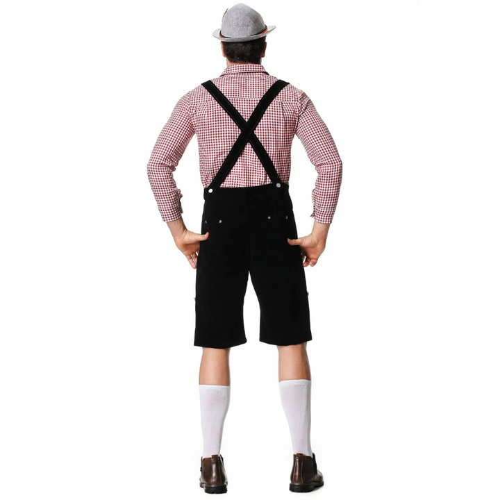 Mann im stilvollen Oktoberfest Trachten-Dreiteiler, bestehend aus Hose, Hemd & Krawatte.