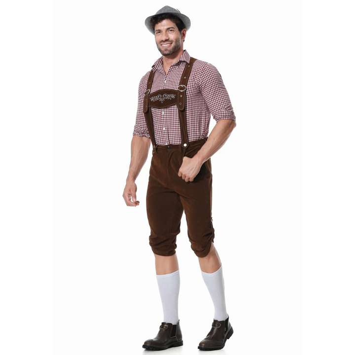 Detailaufnahme des Herren Trachten-Dreiteilers: Stickereien auf Lederhose, Hemd-Details & Krawatte.