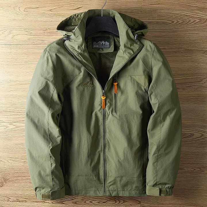 "Herren Outdoorjacke, wasserdicht, atmungsaktiv, in Blau, stilvolles Design, ideal für Wandern und Trekking."