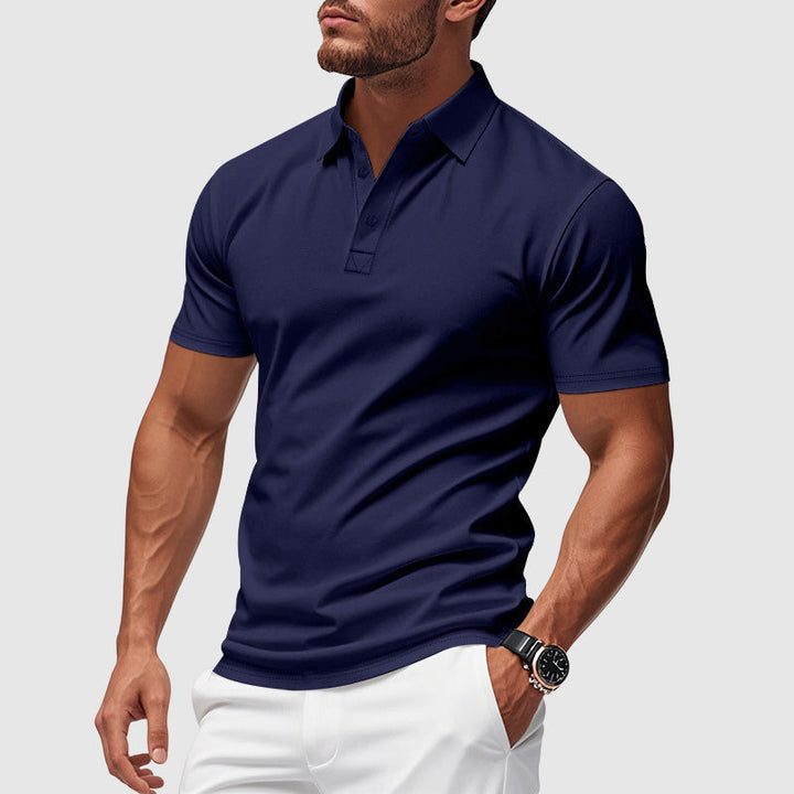 Herren-Poloshirt mit elegantem Schnitt in Blau, ideal für Büro & Freizeit. Kurzarm, bequem & atmungsaktiv.
