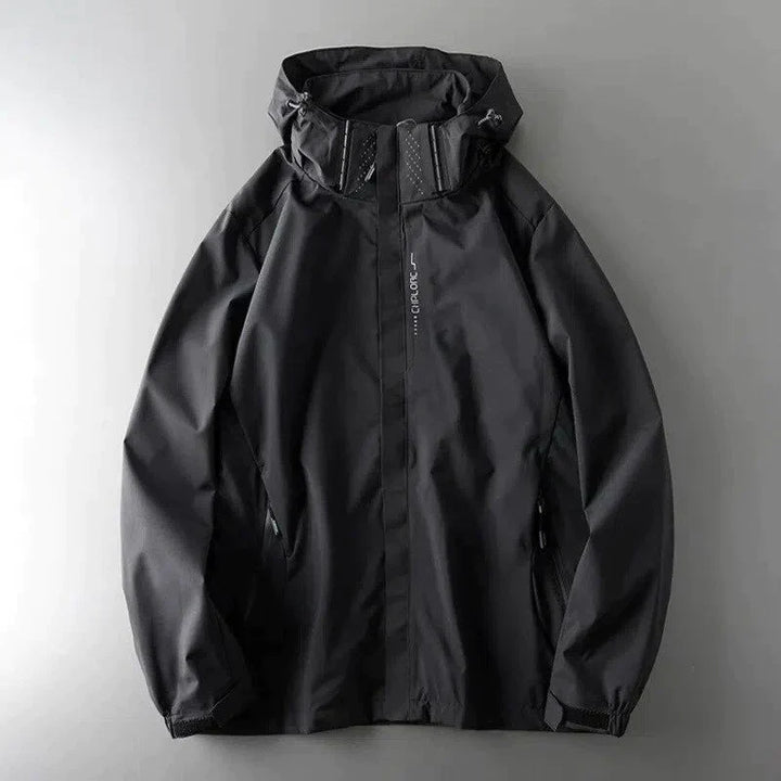 Herren Regenjacke, wasserdicht, mit Kapuze für Outdoor-Aktivitäten im Winter. Perfekter Kälteschutz & Allwetterjacke.