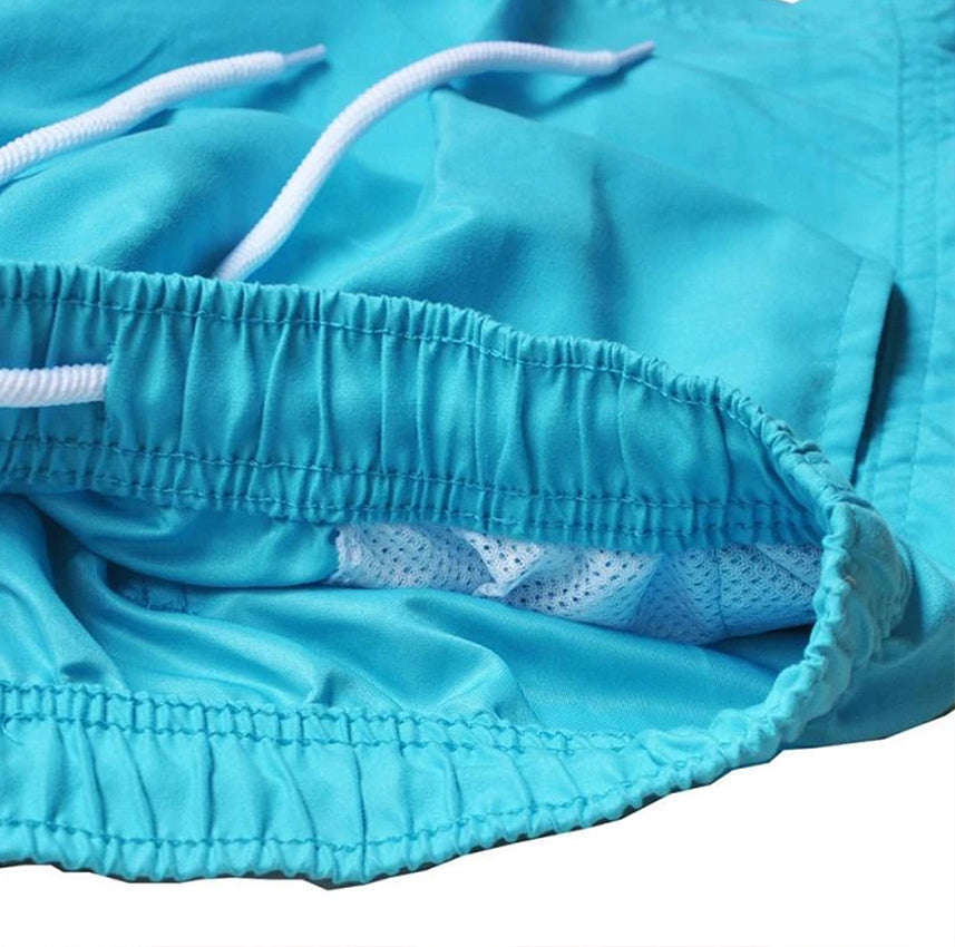 Schnelltrocknende Herren Schwimmshorts in Grün. Für Strand, Pool & Freizeit.