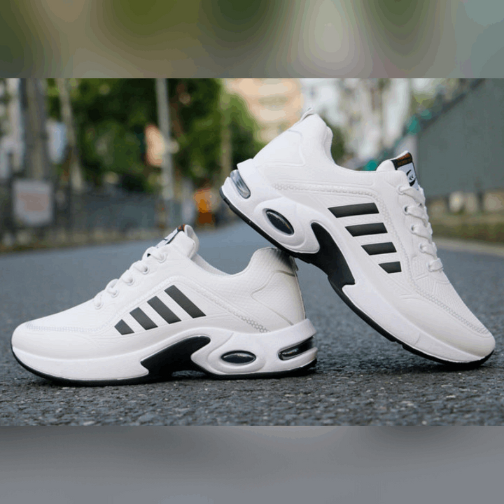 "Herren Sneaker, atmungsaktiv, orthopädisch, mit dämpfender Sohle, leichter Struktur, schwarz-graues Design."