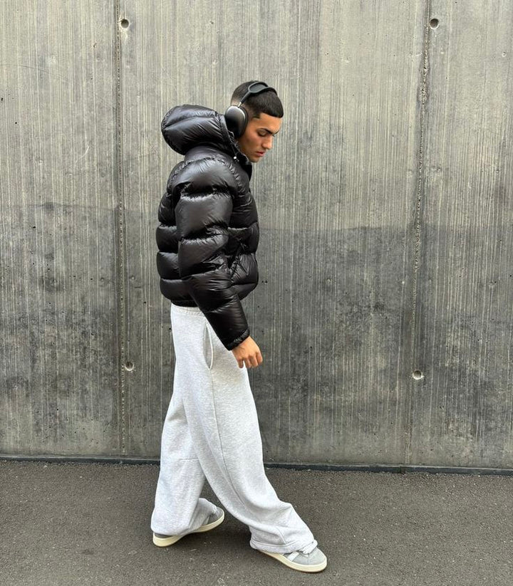 Grüner Herren Pufferjacke Steppmantel, warm und stilvoll, ideal für Wintermode & Freizeit.