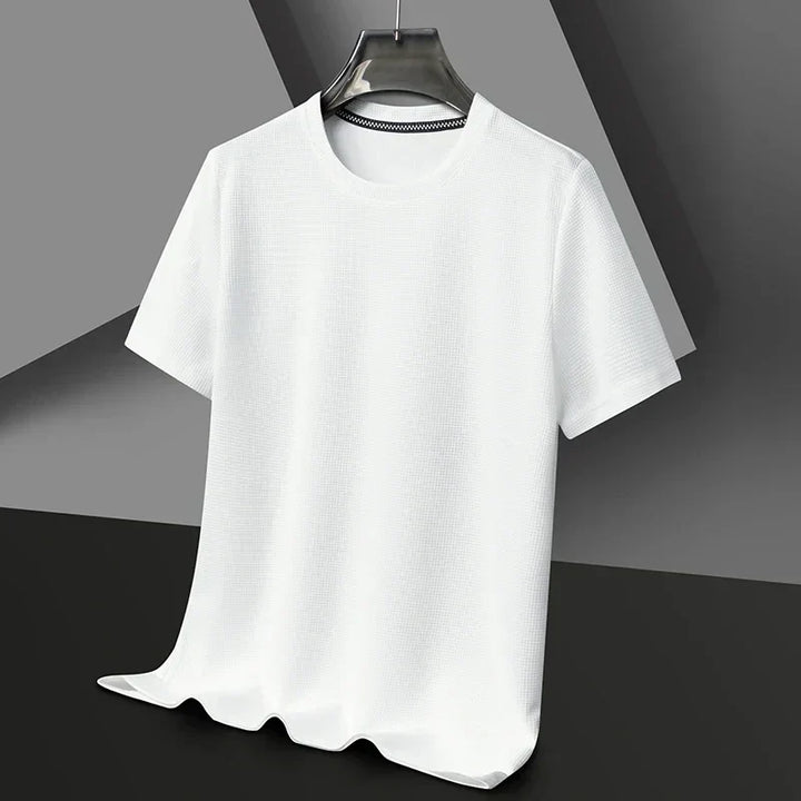 Modisches Herren T-Shirt aus atmungsaktivem Mesh mit Waffelstruktur und Rundhalsausschnitt für heiße Tage.