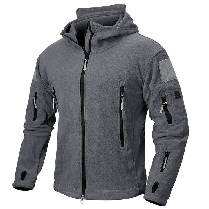 Vielseitige Freizeitjacke für Herren, warm und winddicht. Ideal als Wanderjacke oder taktische Winterkleidung.