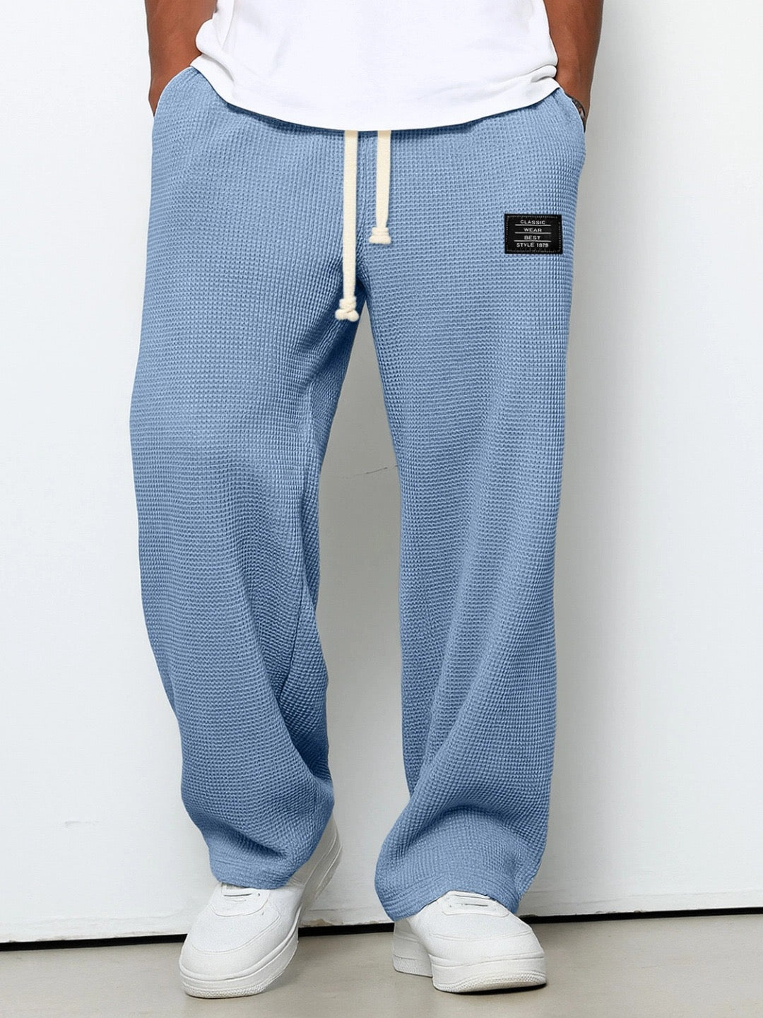 Herren weite Freizeithose Streetwear mit verstellbarem Bund & praktischen Taschen für bequemen Alltagslook.