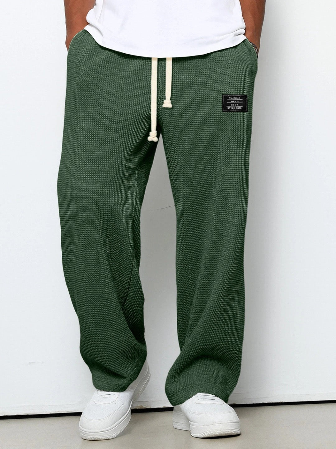Funktionale weite Herren Freizeithose Streetwear. Verstellbarer Bund & praktische Taschen für Komfort & Stil.