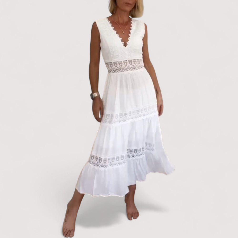 Schwarzes elegantes Damen Freizeitkleid, V-Ausschnitt, taillierter Stufenrock & Spitze. Ideal für Sommer & Urlaub.
