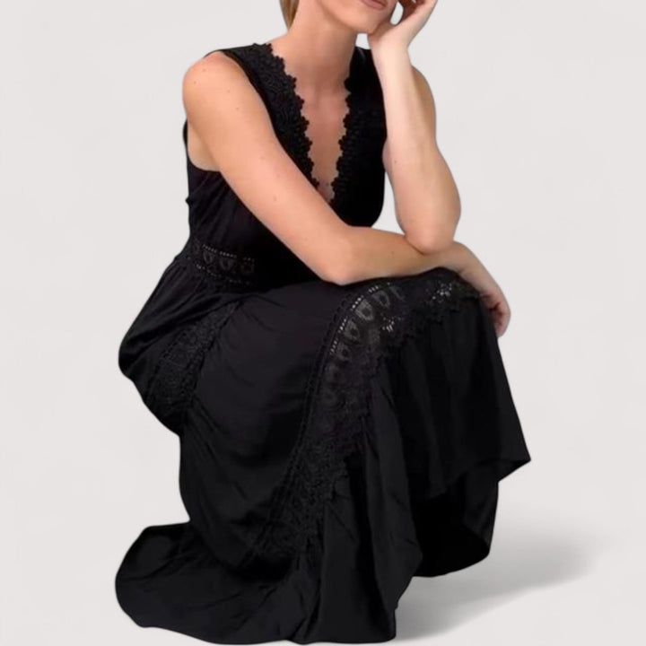 Stilvolles Damen Sommerkleid (Schwarz/Weiß) mit V-Ausschnitt, tailliertem Stufenrock & Spitze. Vielseitiges Freizeitkleid.