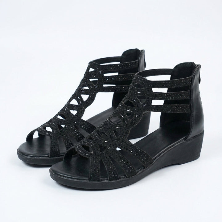 Komfortable orthopädische Damensandalen, elegante Keilsohle, ideal für sommerliche Tage.