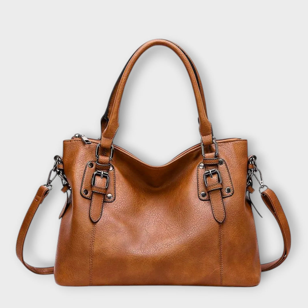 Klassische Damen Handtasche in Braun, elegant & vielseitig für den Alltag. Stilvolles Modeaccessoire.