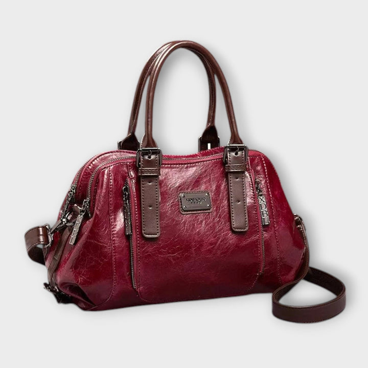 Stilvolle schwarze Damenhandtasche, klassisches Design, ideal als Alltags- und Schultertasche; modisches Accessoire.