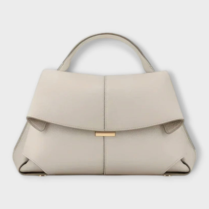 Stilvolle Damenhandtasche mit klassischem Design und praktischem Obergriff, vielseitiges Accessoire.