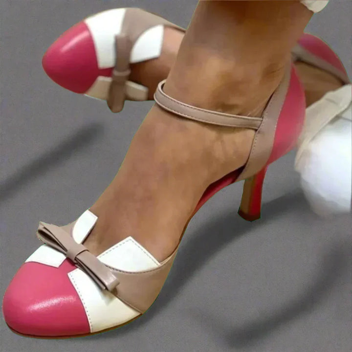 Elegante Damenschuhe: bequeme Pumps mit femininem Schleifenriemen, ideal für stilvolle Anlässe und Büro.