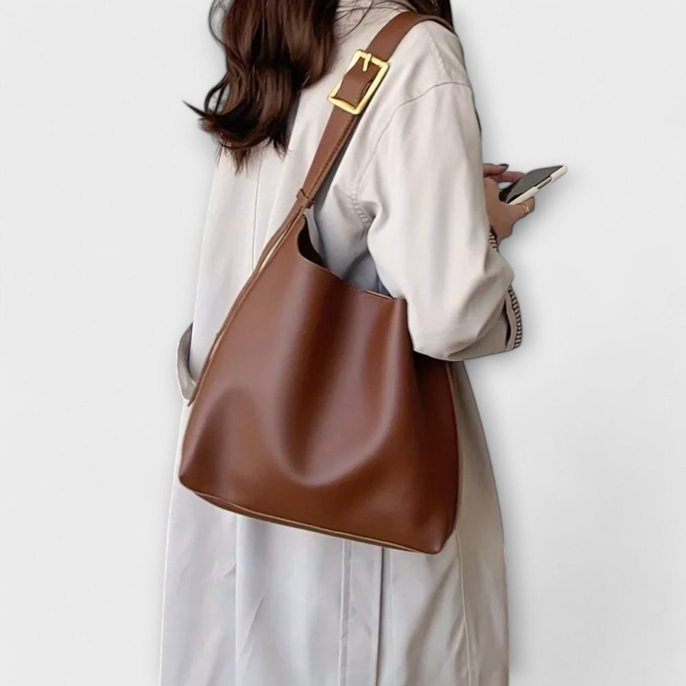 Elegante Damen Handtasche in Braun, klassische Schultertasche, ideales Modeaccessoire für den täglichen Gebrauch.