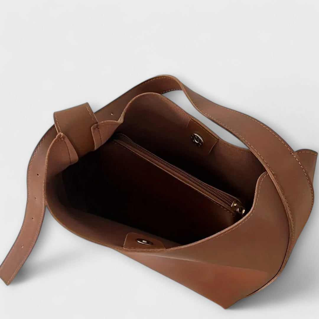 Vielseitige klassische Damen Schultertasche, zeitloses Modeaccessoire für Eleganz im Alltag, in Schwarz.