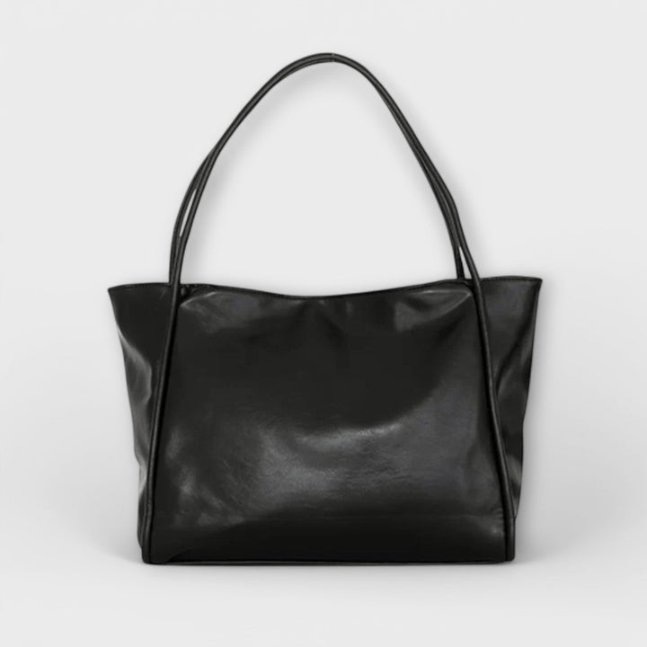 Klassische schwarze Damen-Handtasche, elegant und stilvoll, ideal als Alltagstasche oder Schultertasche.