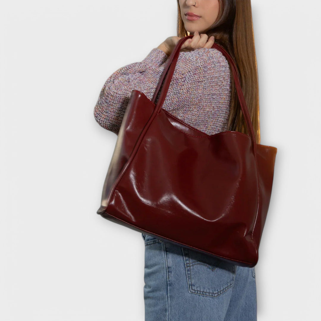 Stilvolle dunkelbraune Damen-Handtasche, klassisches Accessoire für jeden Anlass, ideal als Alltagstasche.