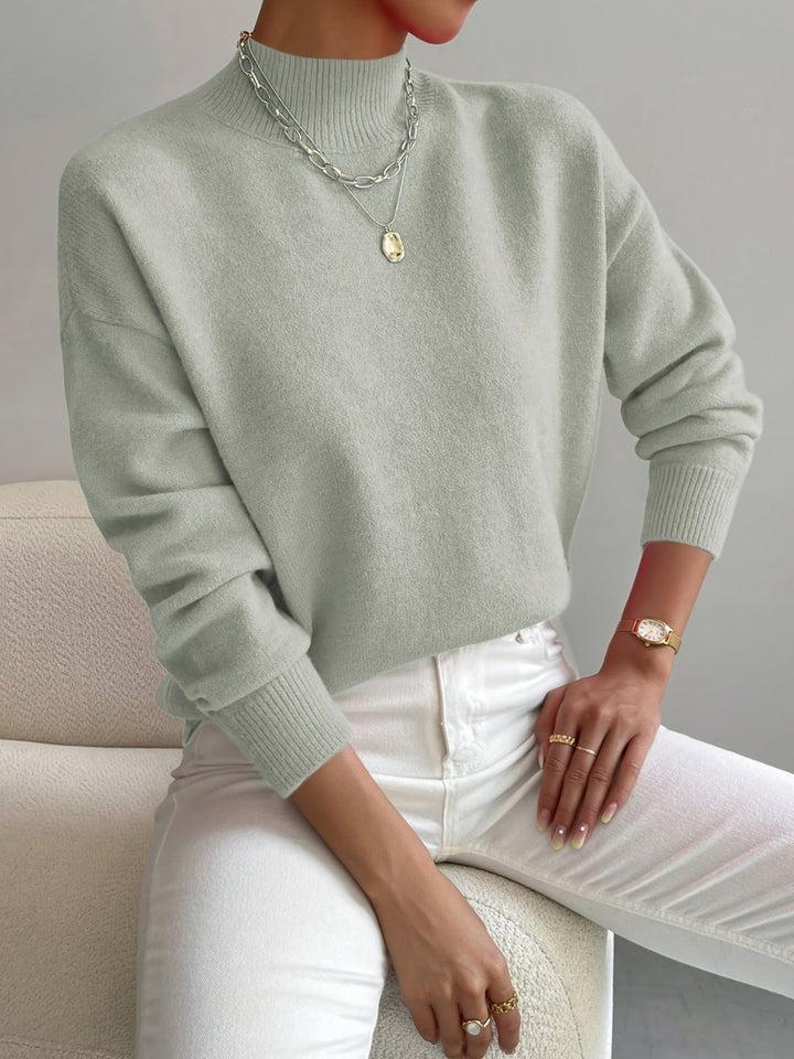 Klassischer Damen Rollkragenpullover für elegante Wärme im Winter; weicher Strickpullover, langärmlig.
