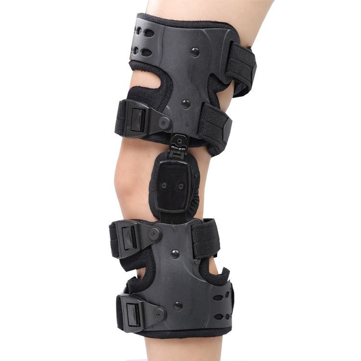 "Kniebandage seitlich in Schwarz, verstellbar für optimale Stabilität und Komfort, geeignet für Sport und Rehabilitation."