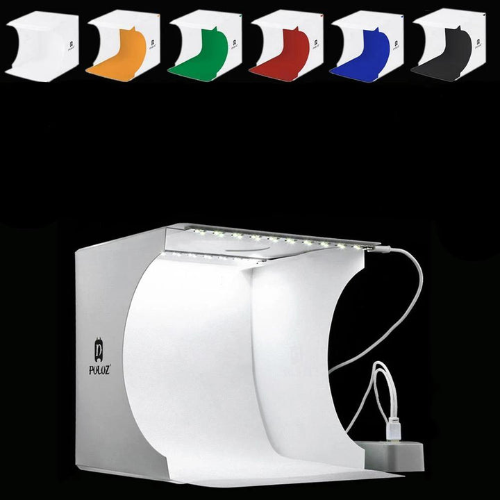 "Kompaktes tragbares Fotostudio mit LED-Licht: Weiße Box, darin hell beleuchtet, ideal für Produktfotografie Gadgets."