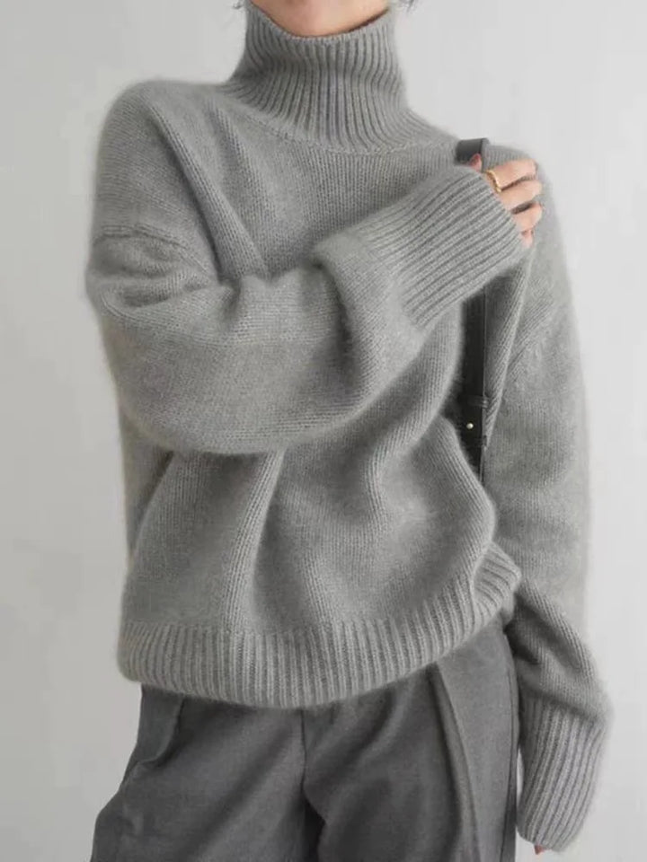Eleganter Damen Rollkragenpullover im klassischen Schnitt, kuschelig warm für den Winter.