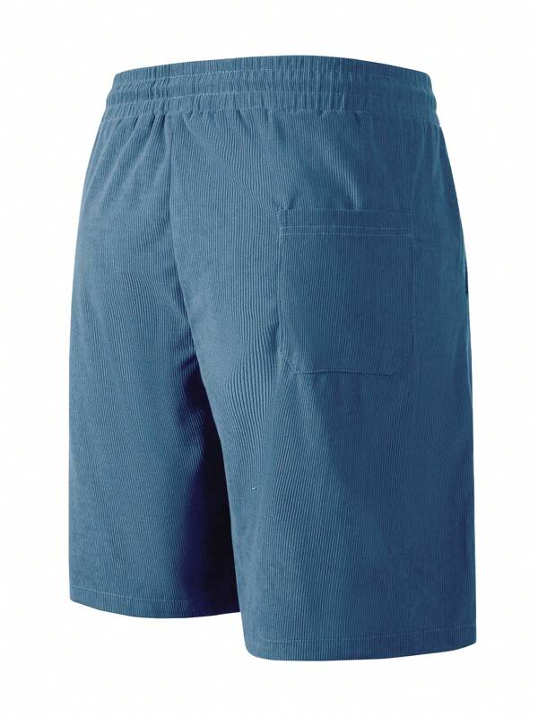 Seitliche Ansicht der bequemen Herren Kordelzug Shorts in Grau, ideal für sommerliche Freizeit und Alltag.