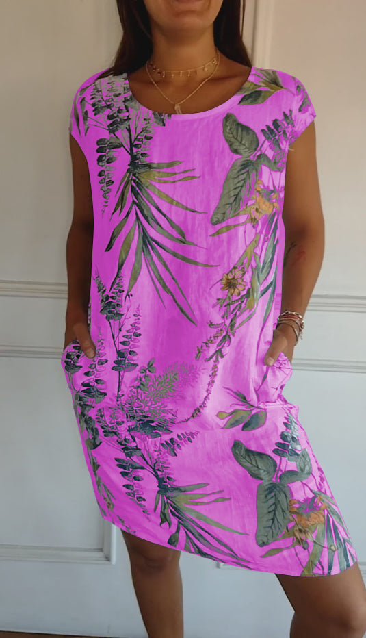 Lässiges Damen Sommerkleid mit frischem Blattmuster. Bequemes Kurzarm-Freizeitkleid für warme Sommertage & Urlaub.