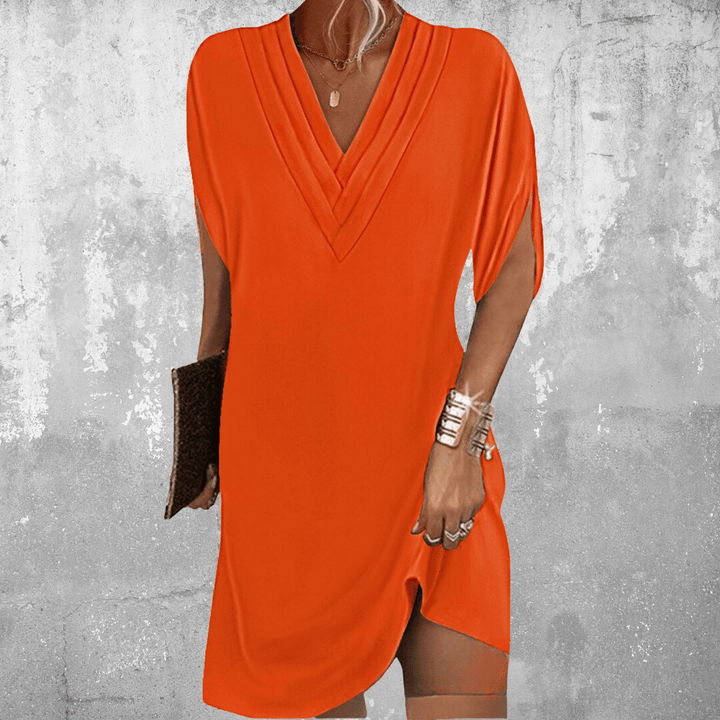 Stilvolles Damenkleid mit V-Ausschnitt, perfekt als Freizeitkleid, Strandmode oder bequemes Sommerkleid für den Urlaub.