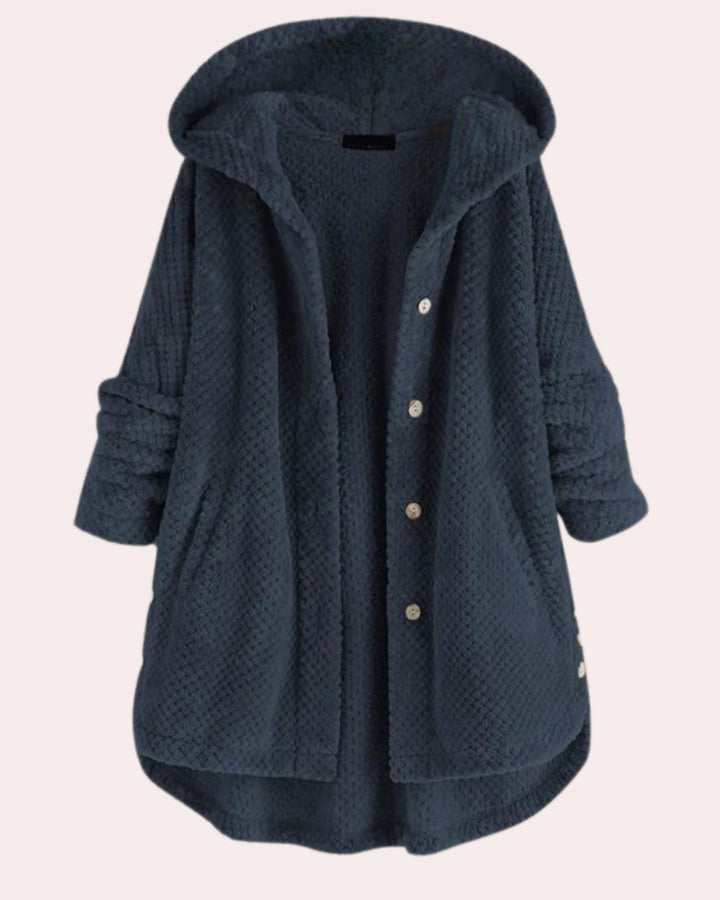 Damen Wintermantel, lang & warm, mit Kapuze. Wasserabweisend und bequem für Outdoor-Aktivitäten und den Alltag im Winter.