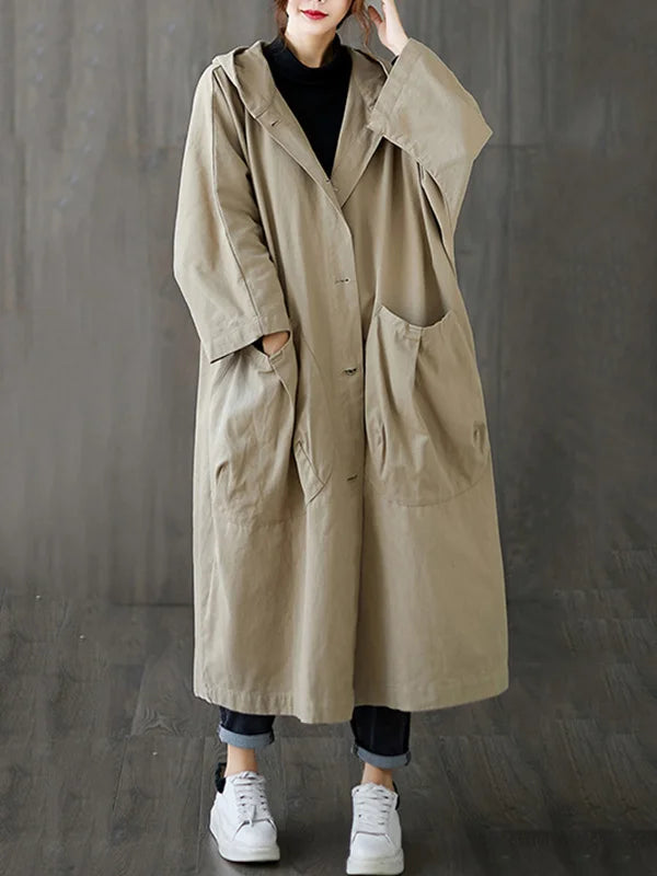 Stilvoller langer Regenmantel für Damen in Grau, wasserdicht und atmungsaktiv, ideal als Übergangsjacke.