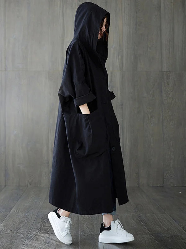 Stylischer, langer Damen-Regenmantel, wasserdicht, mit Kapuze, perfekt für nassen Outdoor-Alltag.