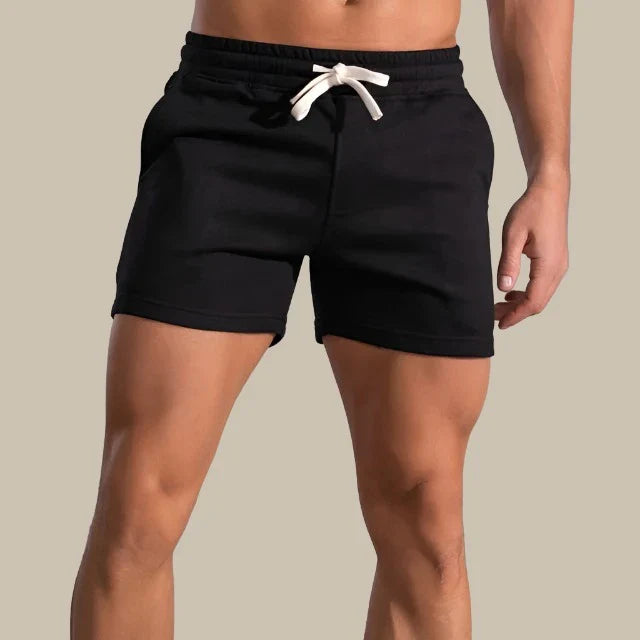 Lässige Herren Slim-Fit Shorts in Blau, moderne Passform, atmungsaktiv, mit Taschen, für Sommeranlässe ideal.