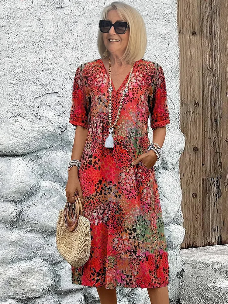 Feminines Damen Midikleid in lebendigen Farben, bequem und lässig. Perfekt als Freizeit- oder Sommerkleid.