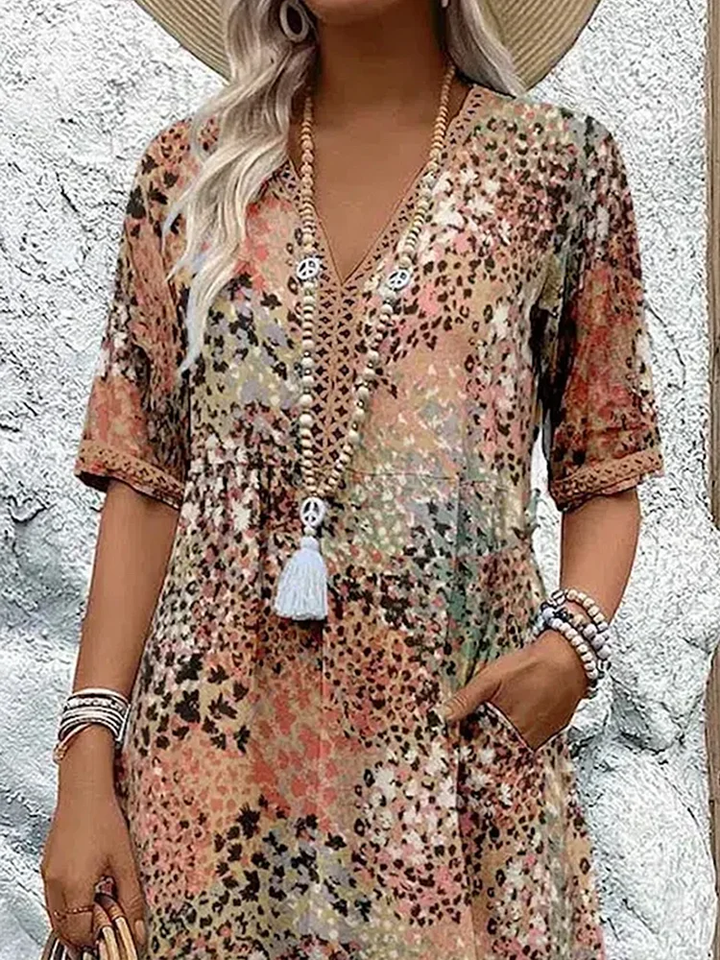 Vielseitiges Damenkleid: Lebendiges Midikleid, das Eleganz & Komfort vereint. Perfekt für Sommer & festliche Events.