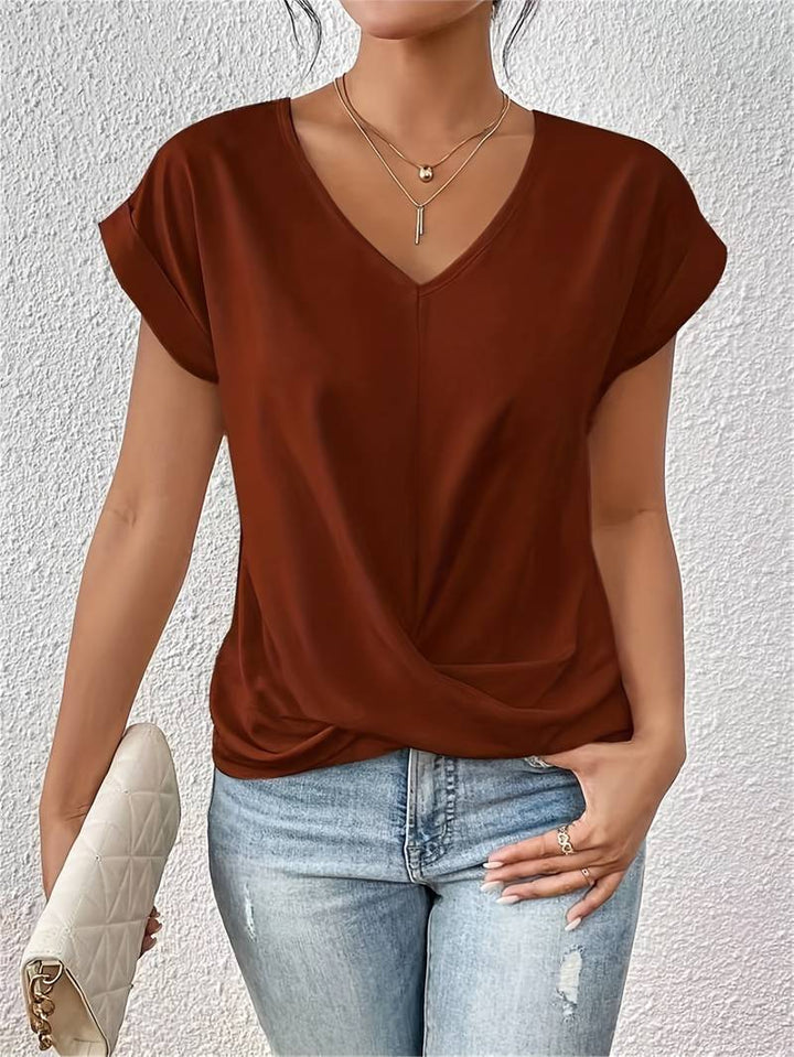 Elegantes Damen Kurzarm Top mit V-Ausschnitt, perfekt für sommerliche Freizeitlooks. Lässiges Oberteil für Damen.