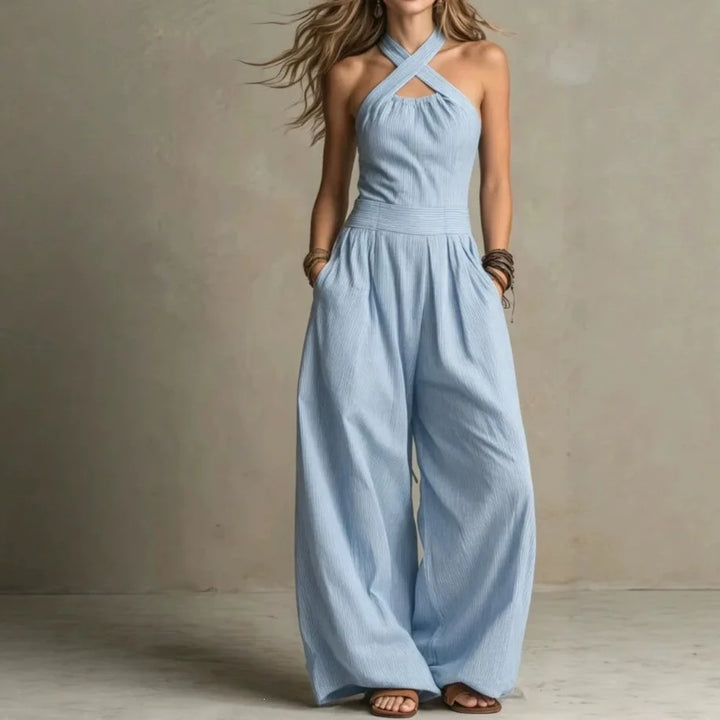 Eleganter Damen Jumpsuit mit Halterneck und weitem Bein für stilvolle Sommer-Looks. Perfekt für festliche Anlässe.
