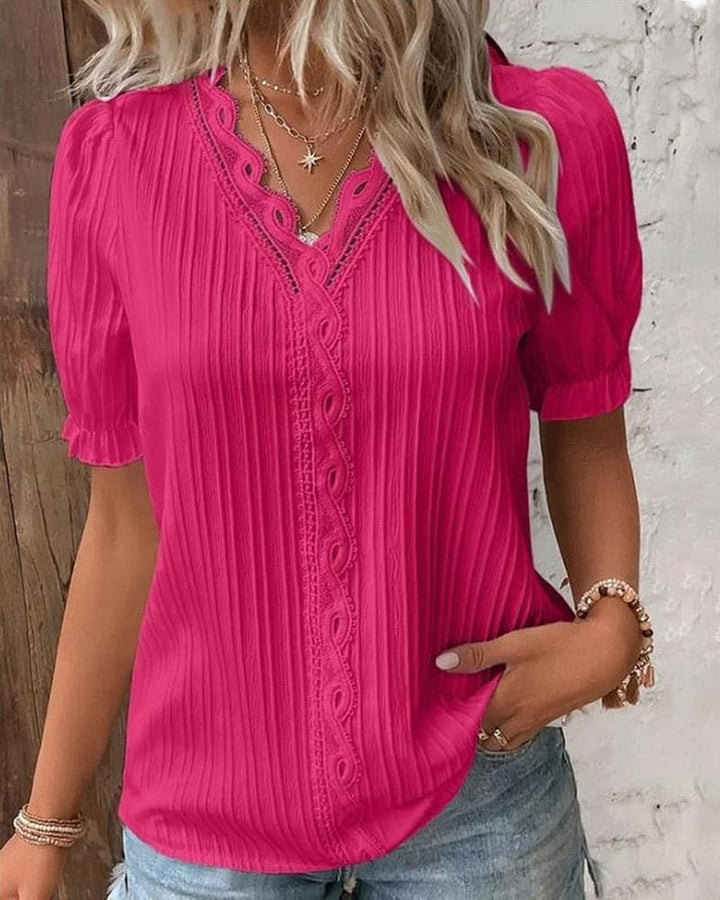 Frontansicht einer eleganten pinkfarbenen Damen Bluse, ideal für Freizeit und Büro.