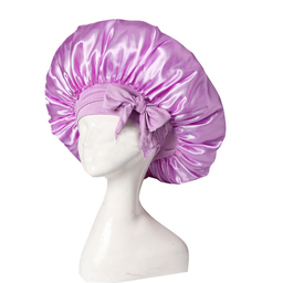 Elegante Schlafhaube in Rosa, schützt und pflegt Haare über Nacht, ideal für gesunde Haarpflege.
