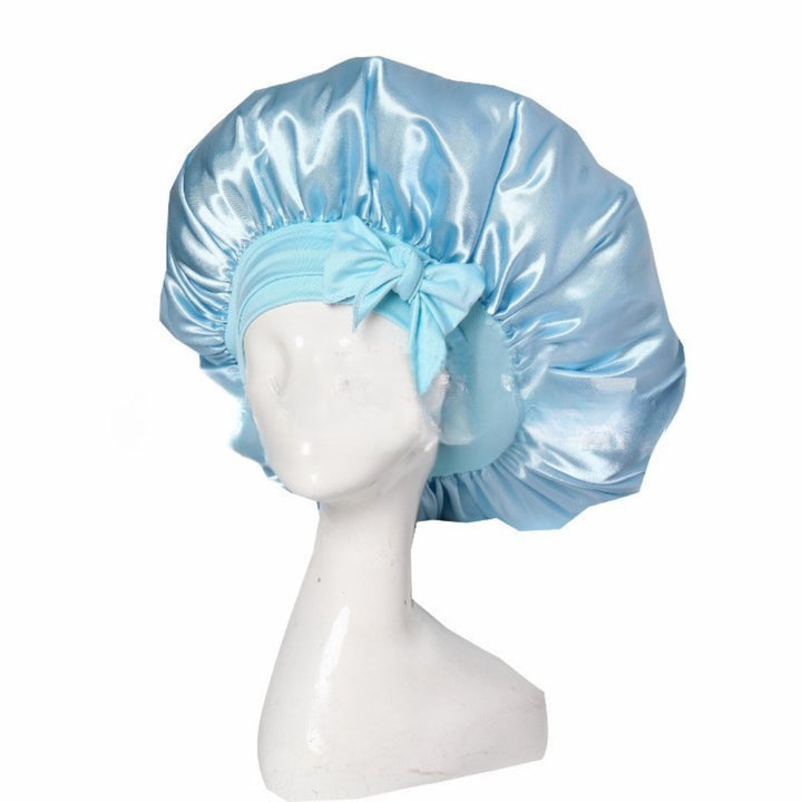 Elegante Schlafhaube in Rosa, schützt und pflegt Haare über Nacht, ideal für gesunde Haarpflege.