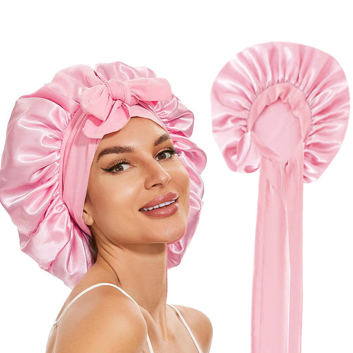 Elegante Schlafhaube in Rosa, schützt und pflegt Haare über Nacht, ideal für gesunde Haarpflege.