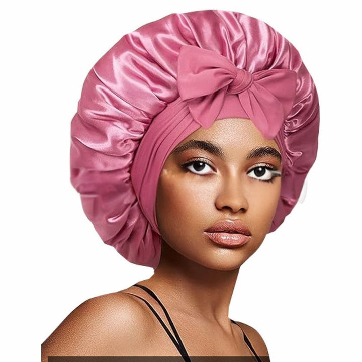Elegante Schlafhaube in Rosa, schützt und pflegt Haare über Nacht, ideal für gesunde Haarpflege.
