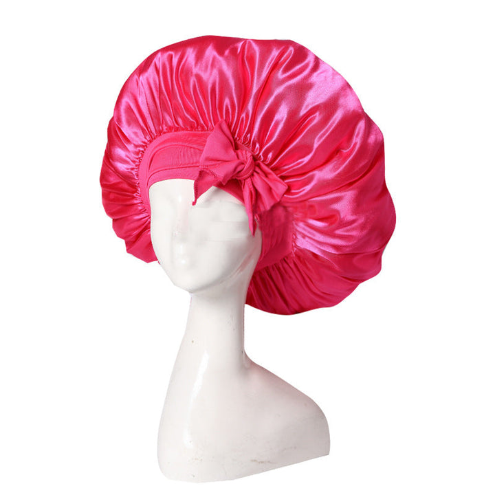 Elegante Schlafhaube in Rosa, schützt und pflegt Haare über Nacht, ideal für gesunde Haarpflege.