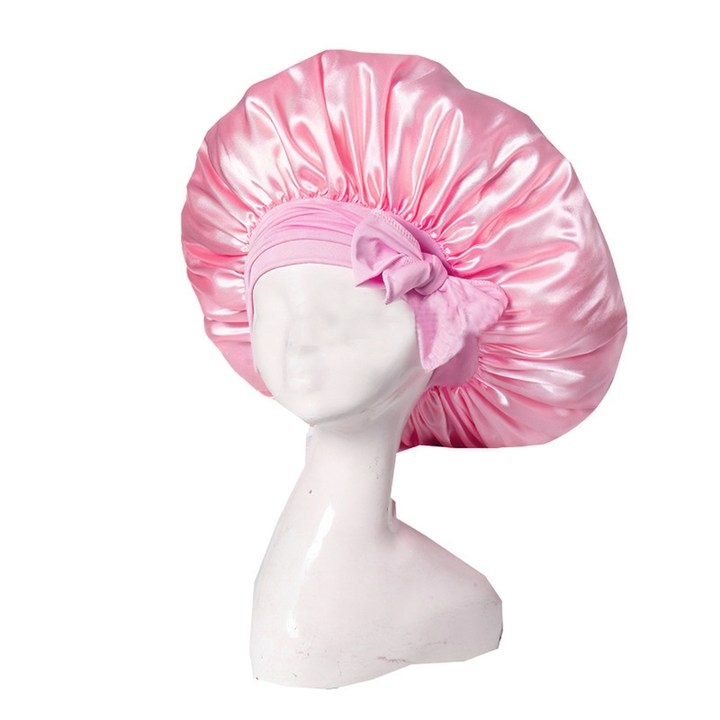 Elegante Schlafhaube in Rosa, schützt und pflegt Haare über Nacht, ideal für gesunde Haarpflege.