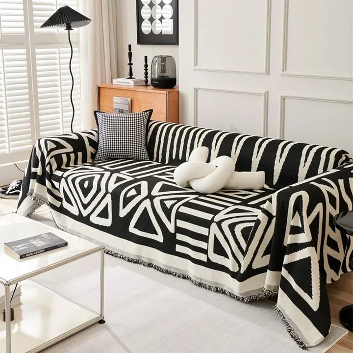 "Luxuriöse Sofadecke aus weichem Chenille mit eleganten Quasten in Boho-Chic-Design, ideal für stilvolles Wohndekor."